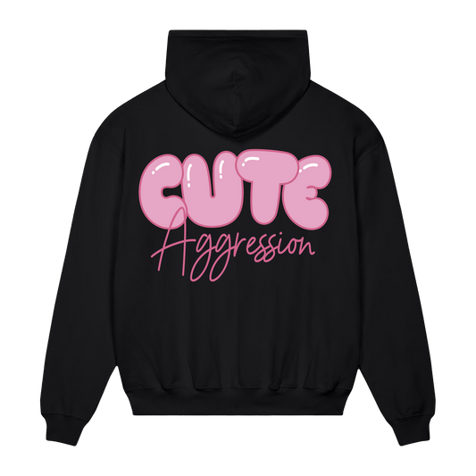 Black hoodie with pink 'Cute Aggression' text across the back