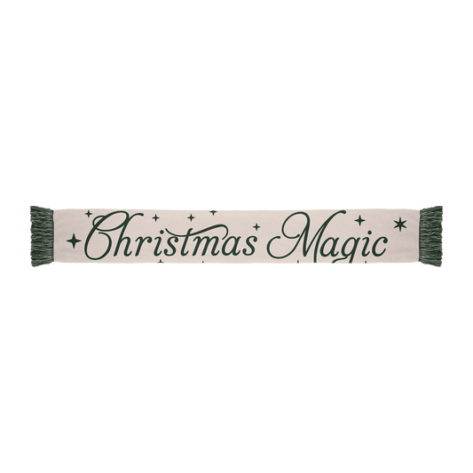 Scarf with green “Christmas Magic” text and matching green frilled ends.