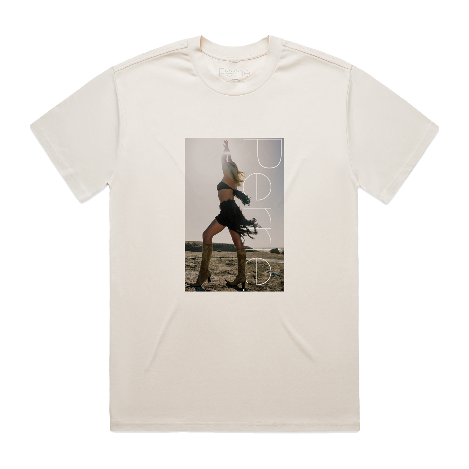 Beige short-sleeve T-shirt with a photo print across the chest and white text reading “Perrie” printed vertically over the image.